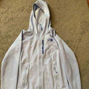 blue zip up north face sweatshirt